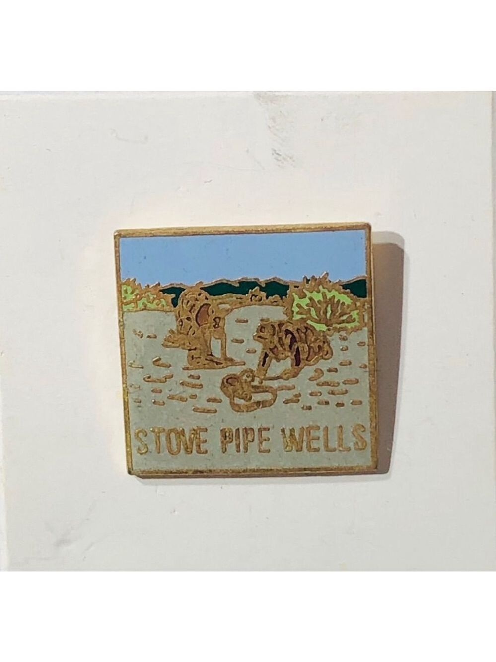 Stove Pipe Wells Landscape Enamel Lapel Pin Gold Tone